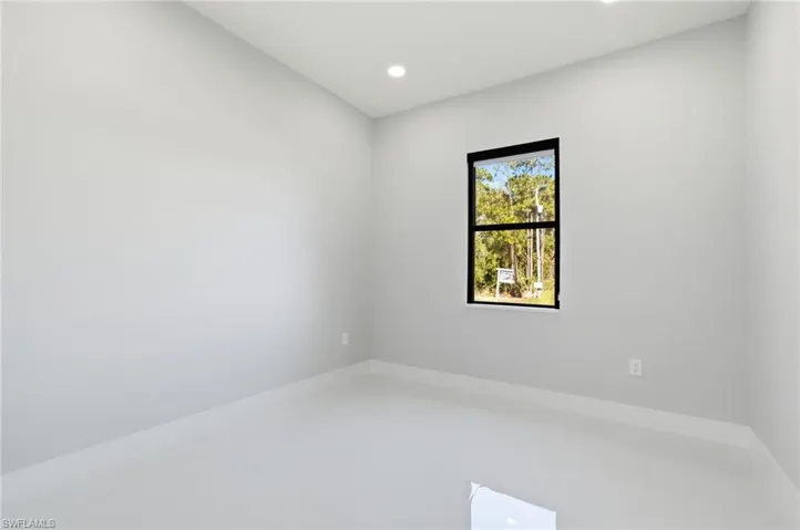 Spare room with recessed lighting