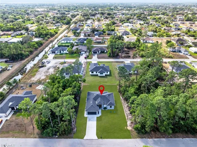 View of property location featuring nearby suburban area