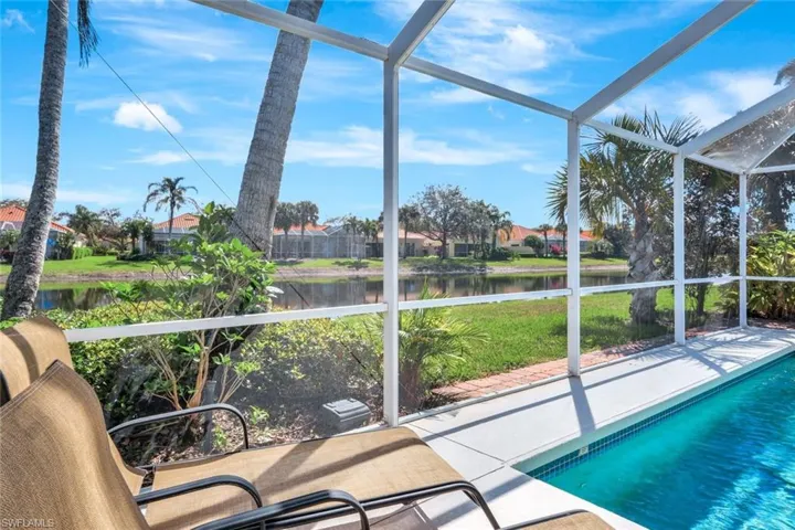 Unfurnished sunroom with a water view
