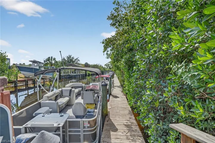 Boat dock on a canal that connects to the Caloosahatchee River