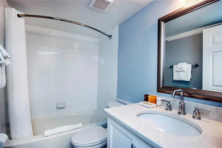 Guest Full bathroom with vanity, toilet, and shower / bath combo