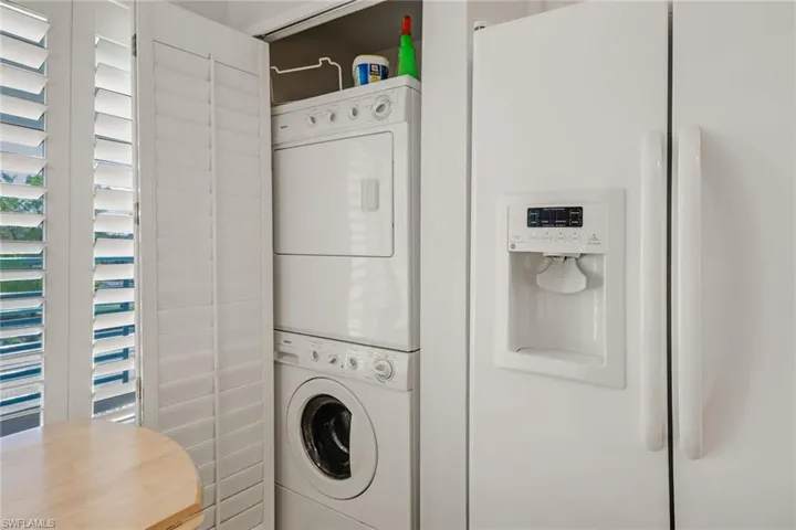 Laundry room with estacked washer and dryer