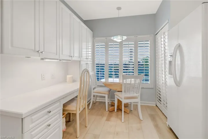 Dining room featuring light wood-style floors and a desk