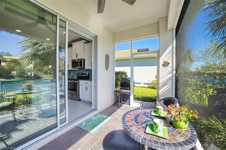 Screened lanai with a ceiling fan