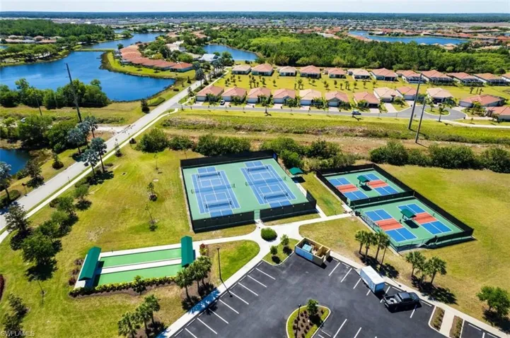 Aerial view featuring a residential view and a water view