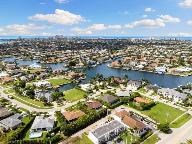 View of urban area with a large body of water and nearby suburban area