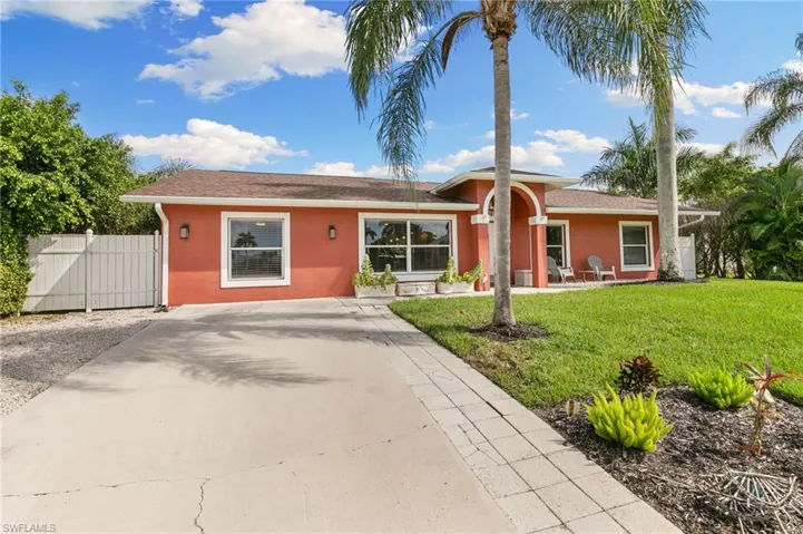 Single story home featuring stucco siding and concrete driveway