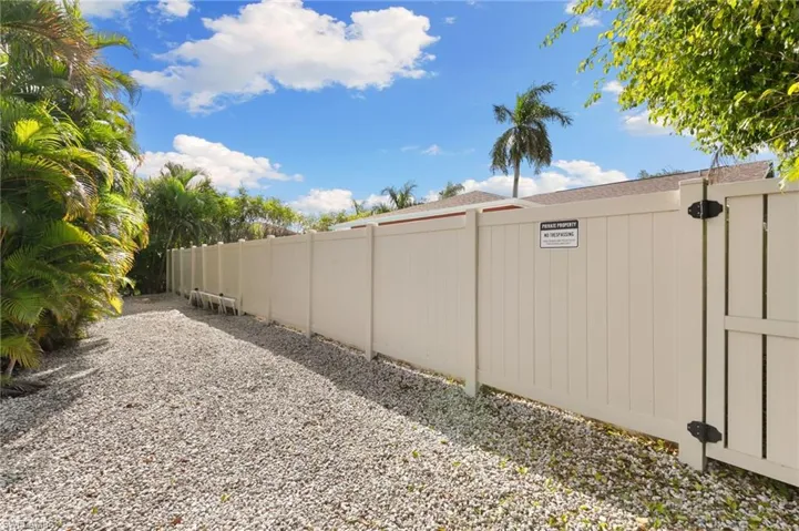 View of yard featuring a gate