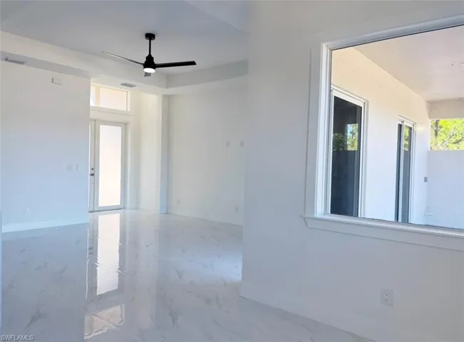Unfurnished room with ceiling fan