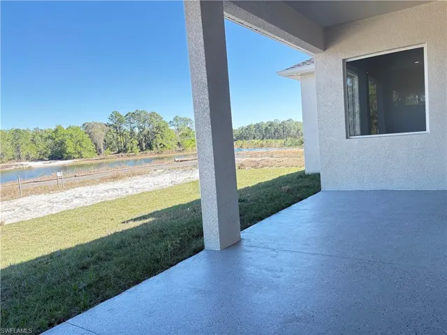 View of patio / terrace featuring a water view