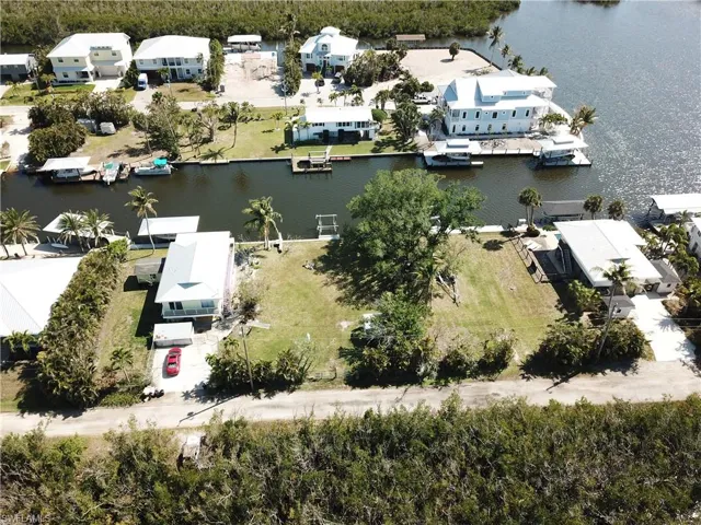Aerial view with a residential view and a water view