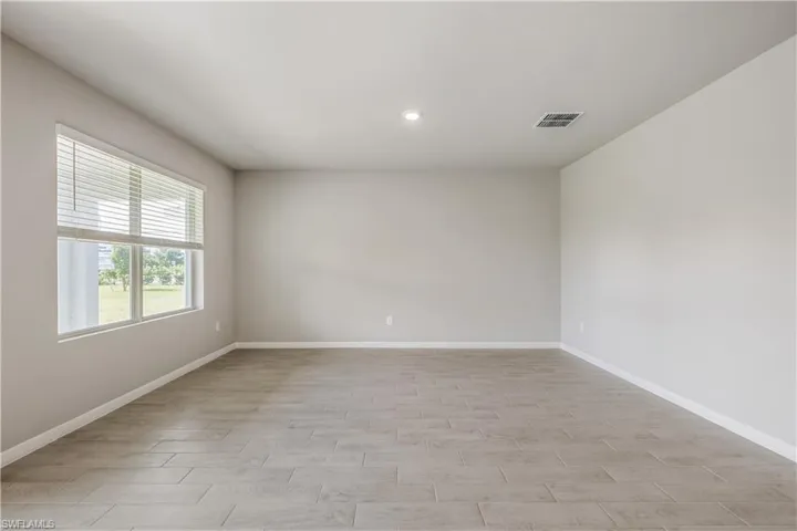Unfurnished room featuring light hardwood / wood-style flooring