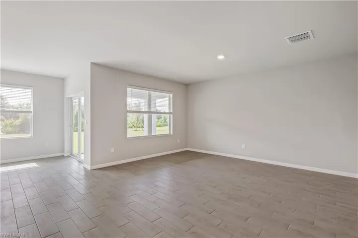 Unfurnished room with light hardwood / wood-style flooring