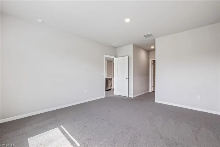 Unfurnished room featuring carpet floors