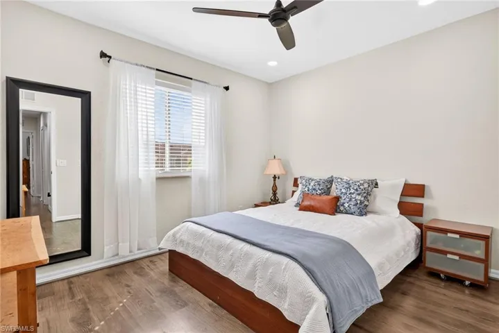 Guest bedroom w/ recessed LED lights