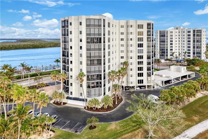 View of property with a water view