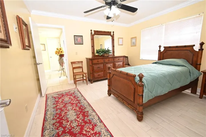 Room featuring light-colored tile flooring and pale yellow walls