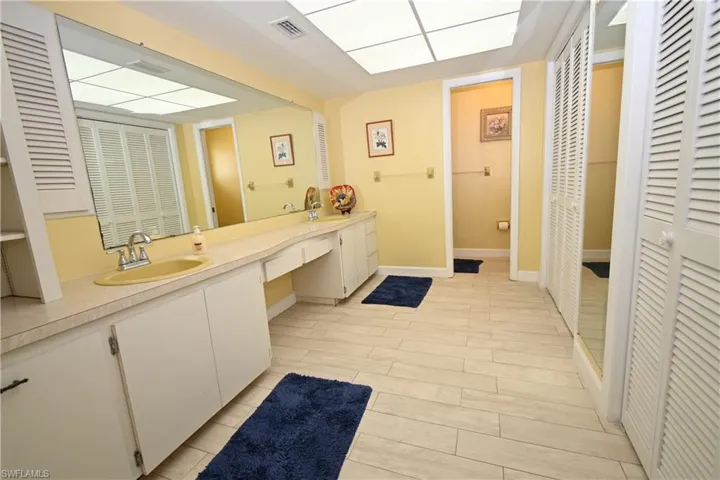 Expansive vanity featuring a built-in sink and ample counter space