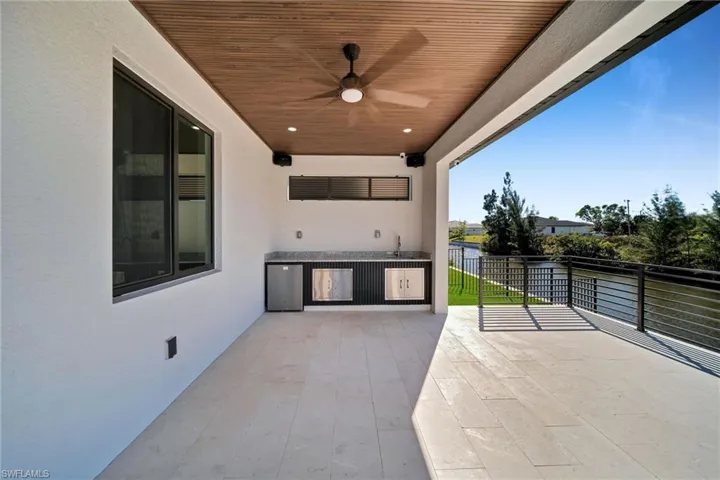 View of patio with ceiling fan