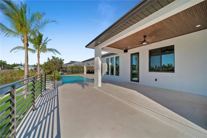 View of patio featuring ceiling fan