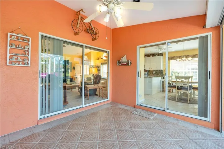 View of patio with ceiling fan