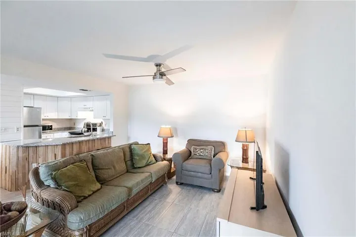 Living area featuring ceiling fan