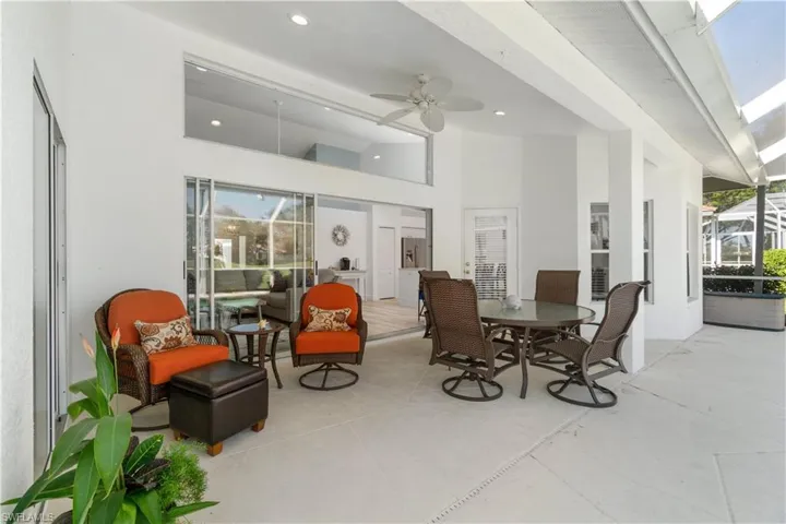 Outdoor dining area with ceiling fan