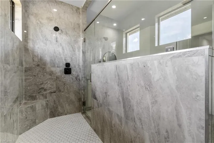 Bathroom with an enclosed shower