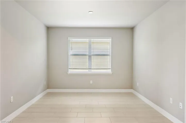 Spare room with baseboards