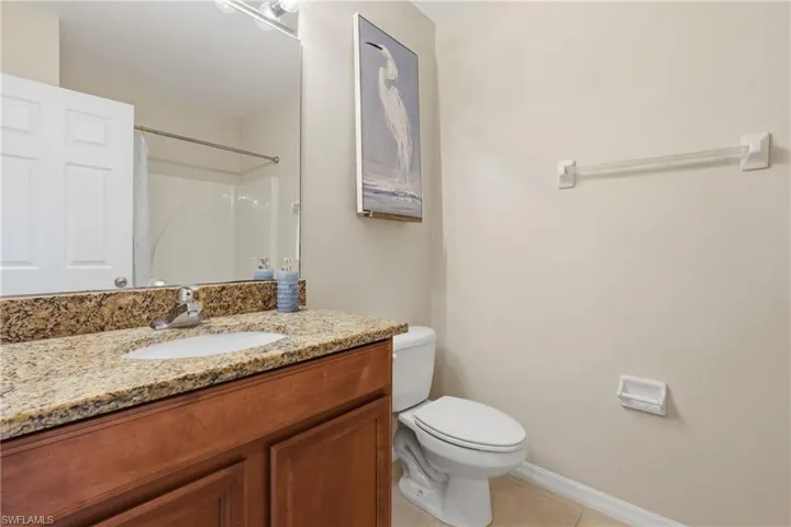 Upstairs guest bathroom with shower tub combo