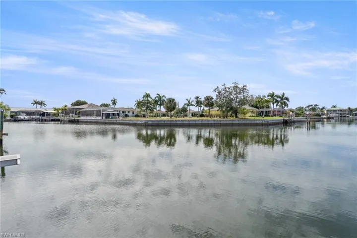 Water view with nearby suburban area