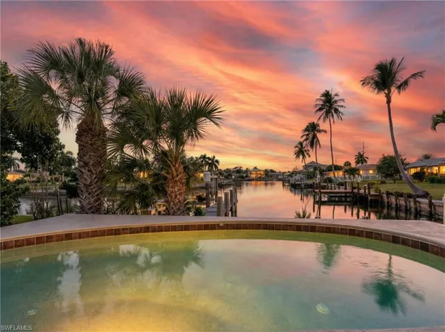 Water view featuring a dock