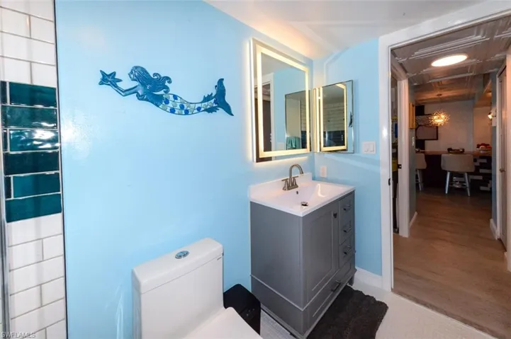 GUEST BATH.  LIGHTED-ANTI FOG MIRROR.