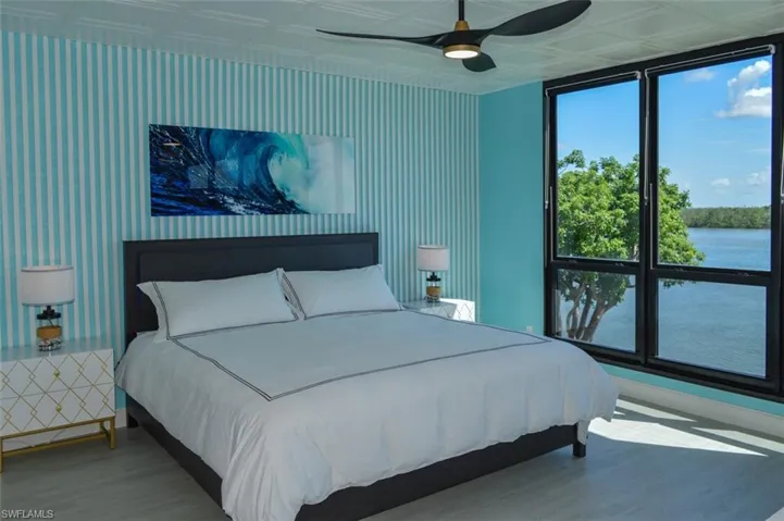 KING SIZE BED.  CUSTOM ZEBRA BLINDS.  REMOTE CONTROLLED CEILING FAN W/LIGHT.