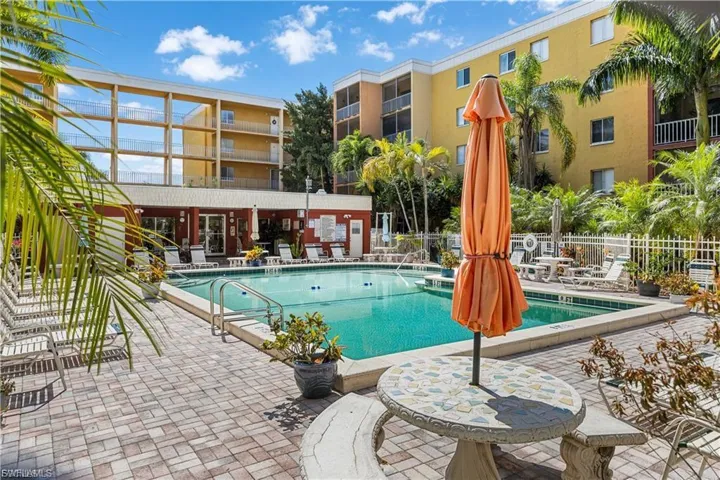 Community pool featuring a patio area
