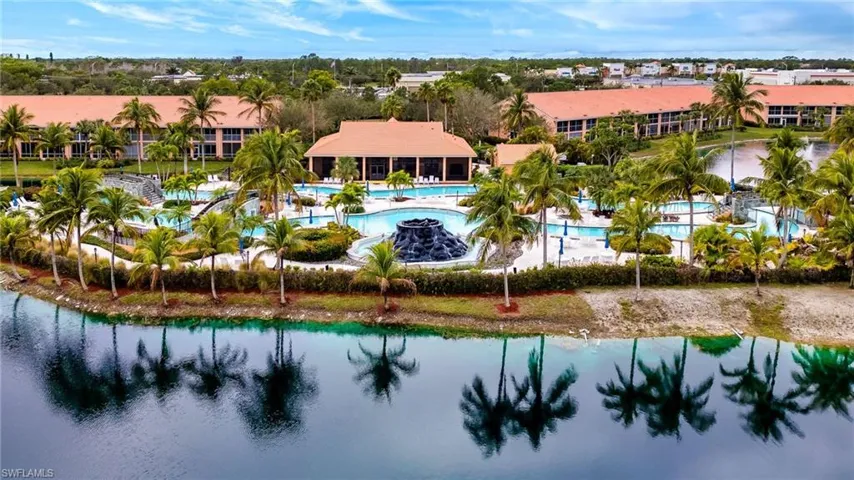 Bird's eye view of a pool and a large body of water