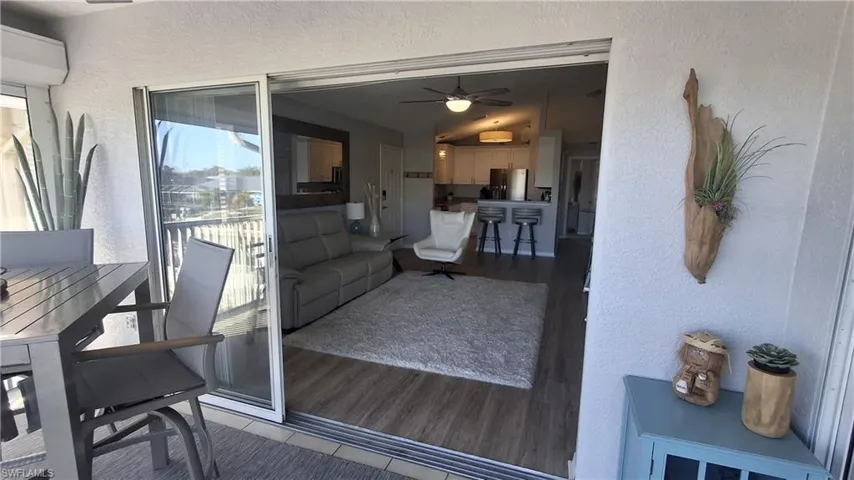 Wide three panel sliding door bring the outside in