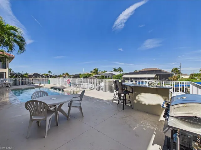 Large pool patio deck with Bar and BBQ grill