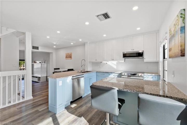 Dual tone cabinetry and granite countertops