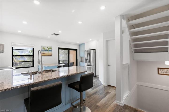 Floor plan remodeled to open up the kitchen.