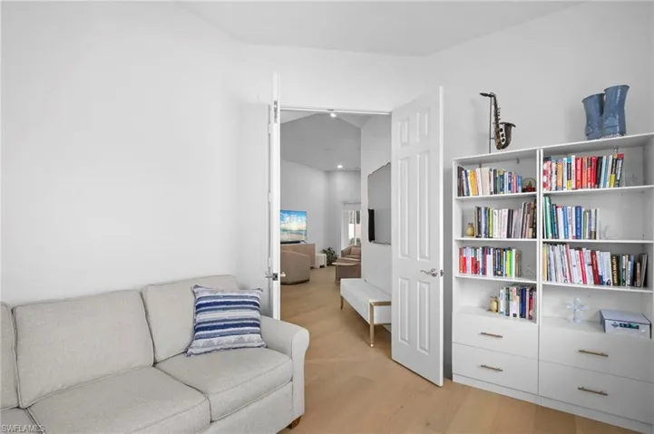 Sitting room featuring light wood flooring
