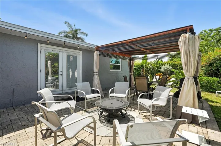 View of patio / terrace featuring french doors and a fire pit