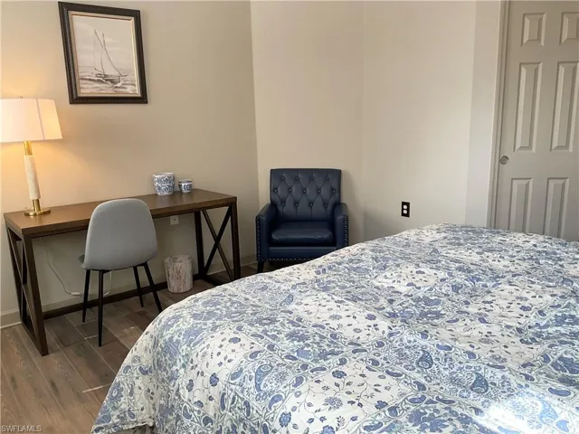 Guest Bedroom featuring king sized bed and desk