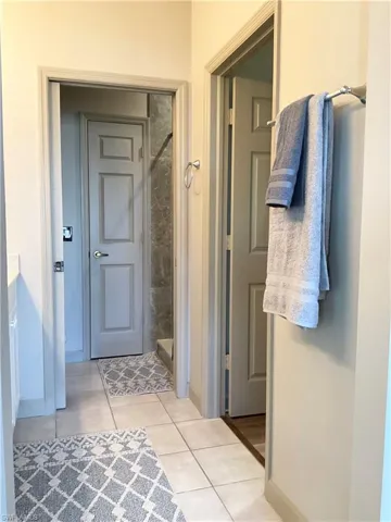 Primary bathroom walk-in shower and dual sinks
