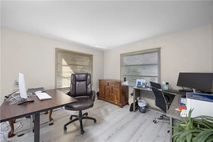 Office area with light wood finished floors