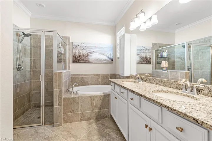 MASTER BATHROOM WITH A GLASS WALK-IN SHOWER & SOAKING TUB! SIMPLY BEAUTIFUL!
