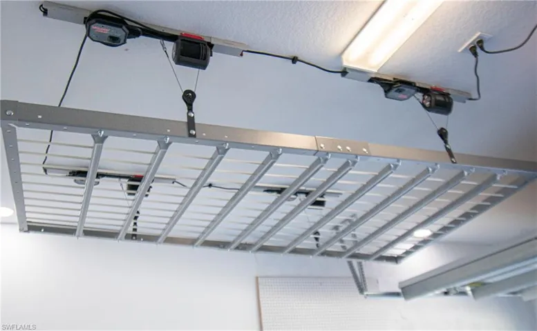 THE ELECTRICAL MOTORIZED LIFT RACKS CAN BE WORKED BY WI-FI. PROFESSIONALLY INSTALLED BY THE "MONKEY BAR' COMPANY!