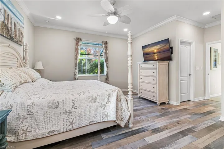 LARGE MASTER BEDROOM WITH UNBELIEVABLE LUXURY VINYL PLANK FLOORING. YOU SIMPLY HAVE TO SEE IT IN PERSON TO TRULY APPRECIATE IT'S BEAUTY!