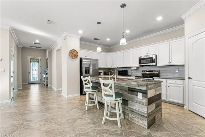 WOW! NOTE THE TILED SHIP-LAP ON THE COUNTER & BACKSPLASH! IT'S EVEN MORE STRIKINGLY BEAUTIFUL IN PERSON!
