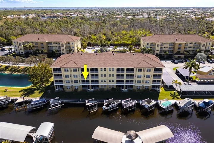 Aerial view of a large body of water and apartment complex